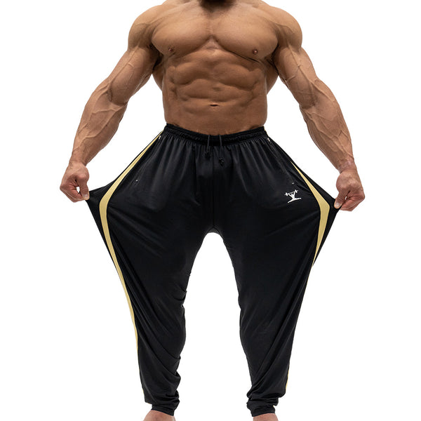 Jujimufu Lite Stretchy Pants Black And Gold Color - Showing Stretch Fabric
