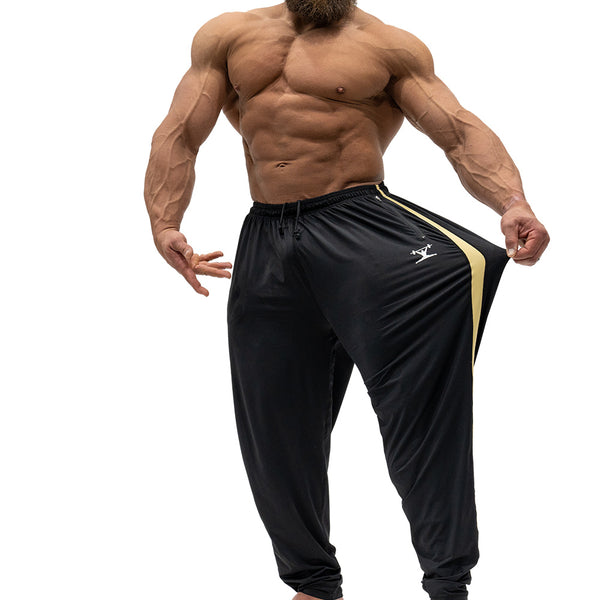 Jujimufu Lite Stretchy Pants Black And Gold Color - Showing Stretch Fabric on a single leg